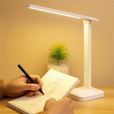 Lampe de bureau LED à lumière chaude utilisée pour le dessin, offrant un éclairage doux et confortable pour les yeux.
