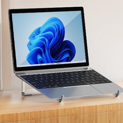 Ordinateur portable posé sur un support ergonomique en aluminium stable