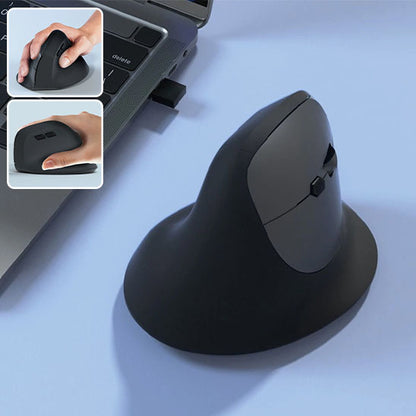 Souris ergonomique verticale sans fil posée à côté d’un ordinateur portable pour une posture naturelle