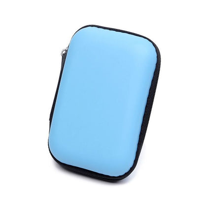 Organisateur de câble bleu avec finition lisse et fermeture solide, idéal pour vos déplacements.