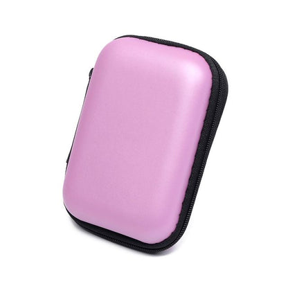 Organisateur de câble rose  avec finition lisse et fermeture solide, idéal pour vos déplacements.
